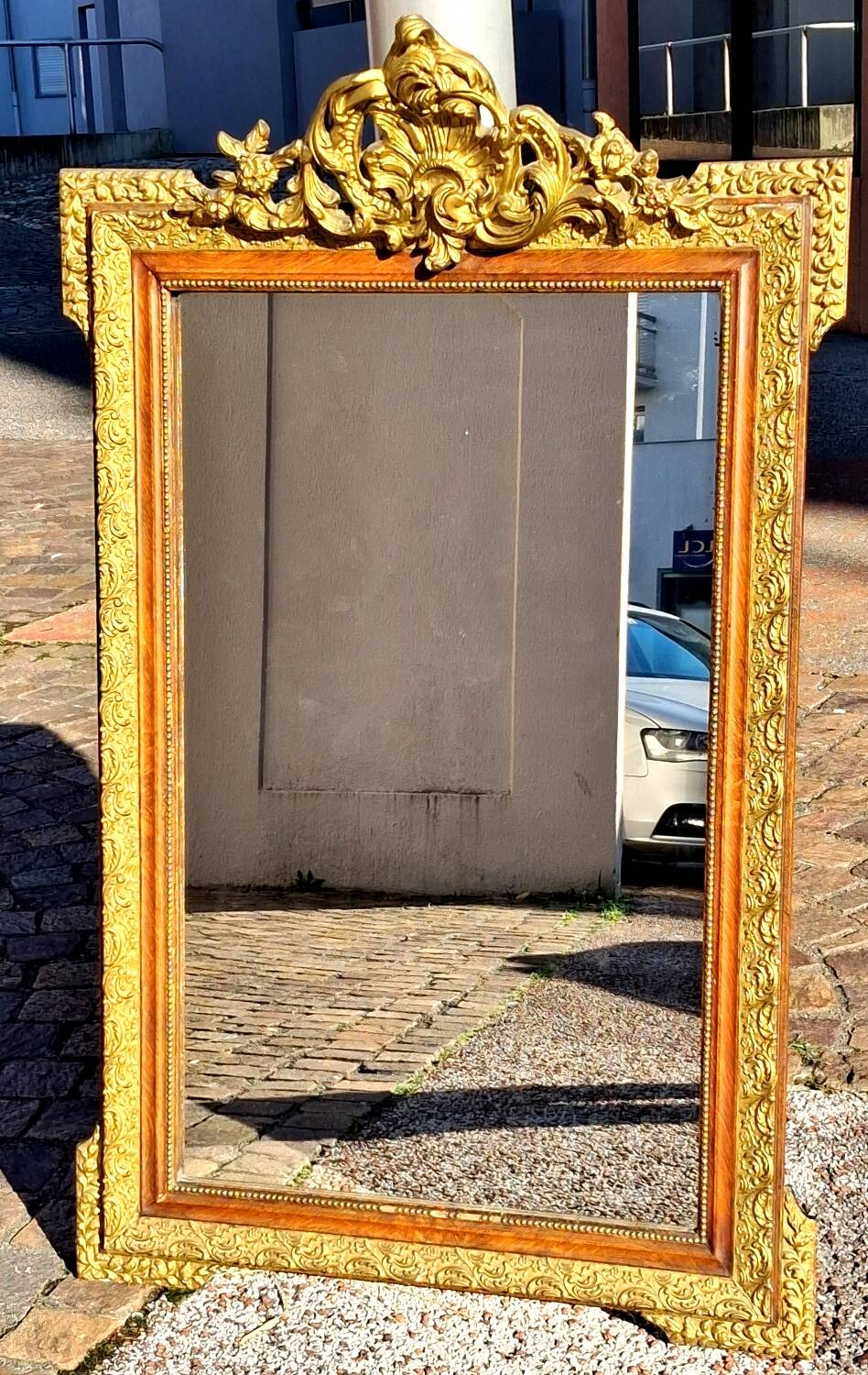 Authentic original Italian fireplace mirror, frame and pediment.