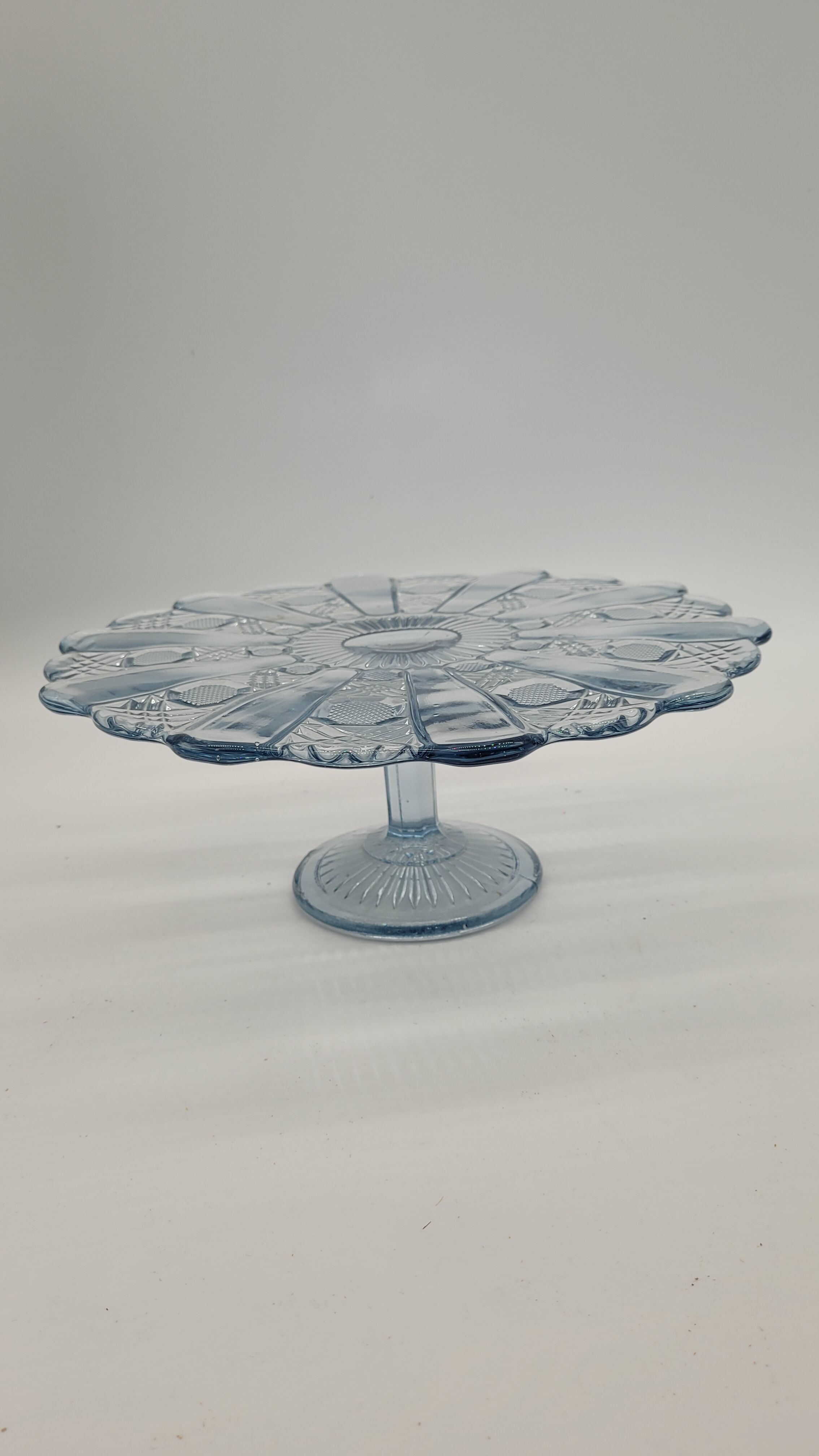 Pie dish or cake on foot blue molded glass