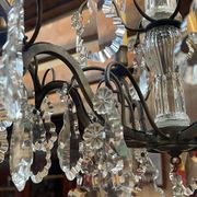 Bronze and cut crystal chandelier with 6 lights, early 20th century work.