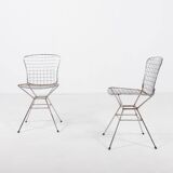 Pair of vintage Italian architectural design steel wire chairs from the 1970s