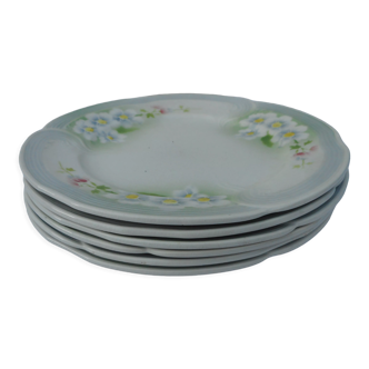 Lot de six assiettes plates en faïence