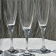 Set of 5 glass champagne flutes with twisted ribbed base