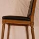 Antique Louis XVI style chair in solid wood and patinated leather.