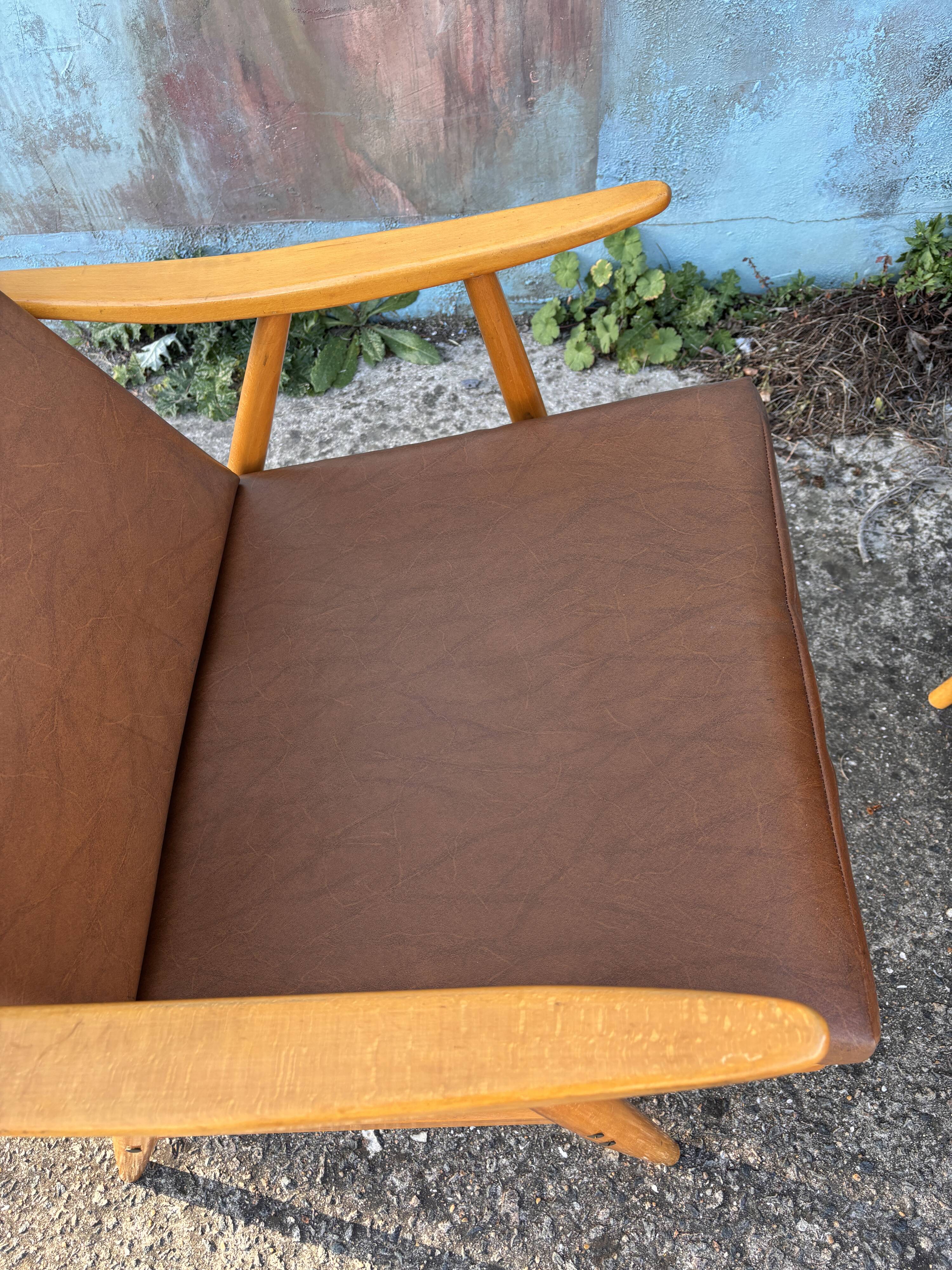 Pair of vintage armchairs with compass legs, "Boomerang" model by THO editions.