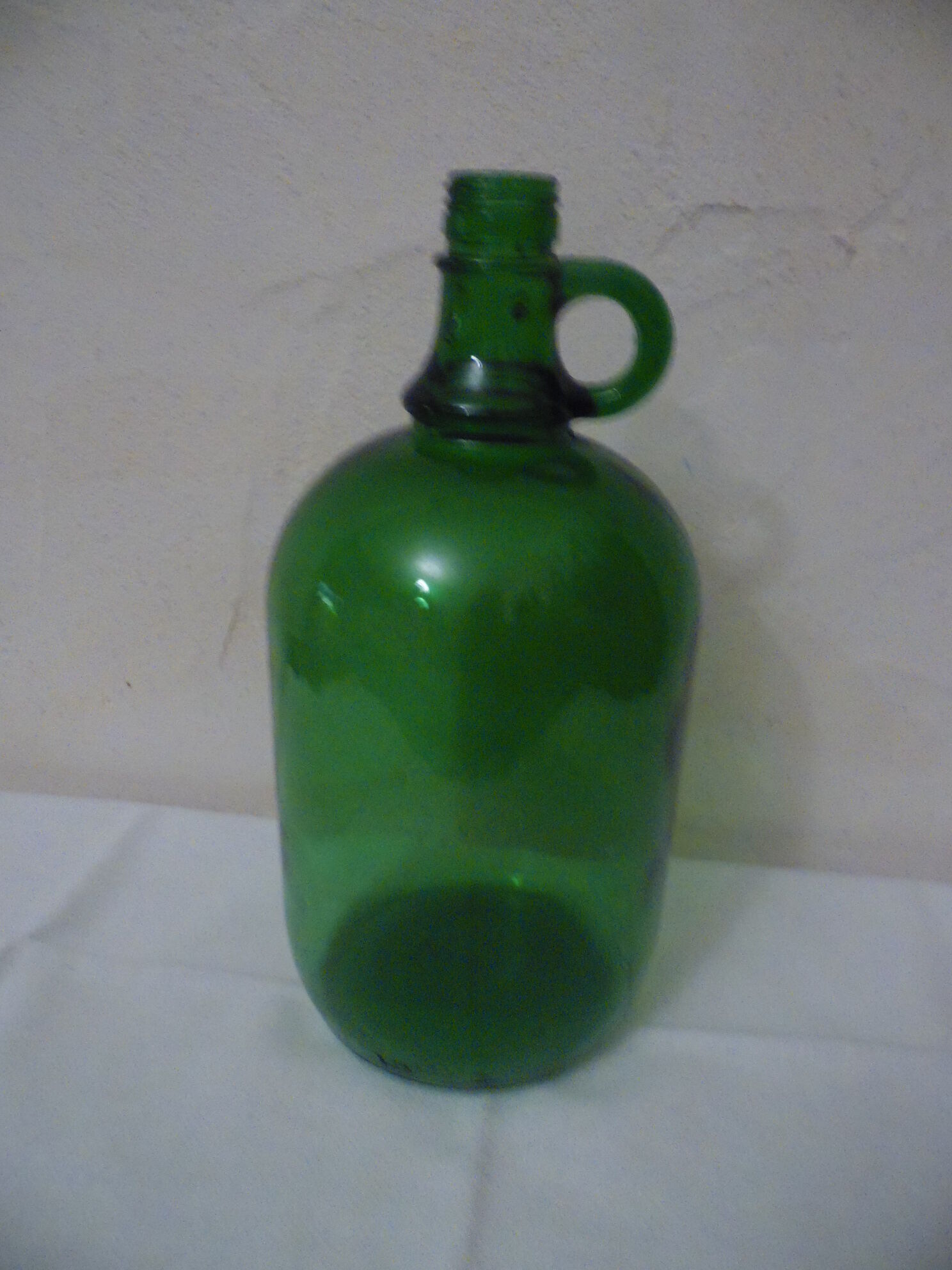 Cylinder glass handle a transparent color dark green