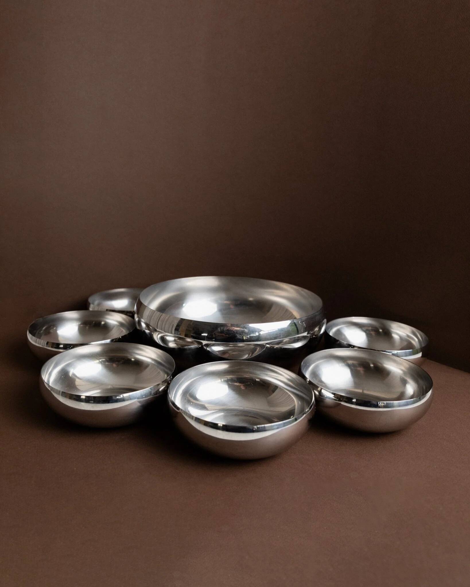 Set of 7 silver stainless steel bowls Space Age vintage Italian design stackable and elegant