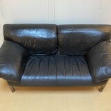 Pair of black leather sofas produced by Poltrona Frau, circa 1980/1990.