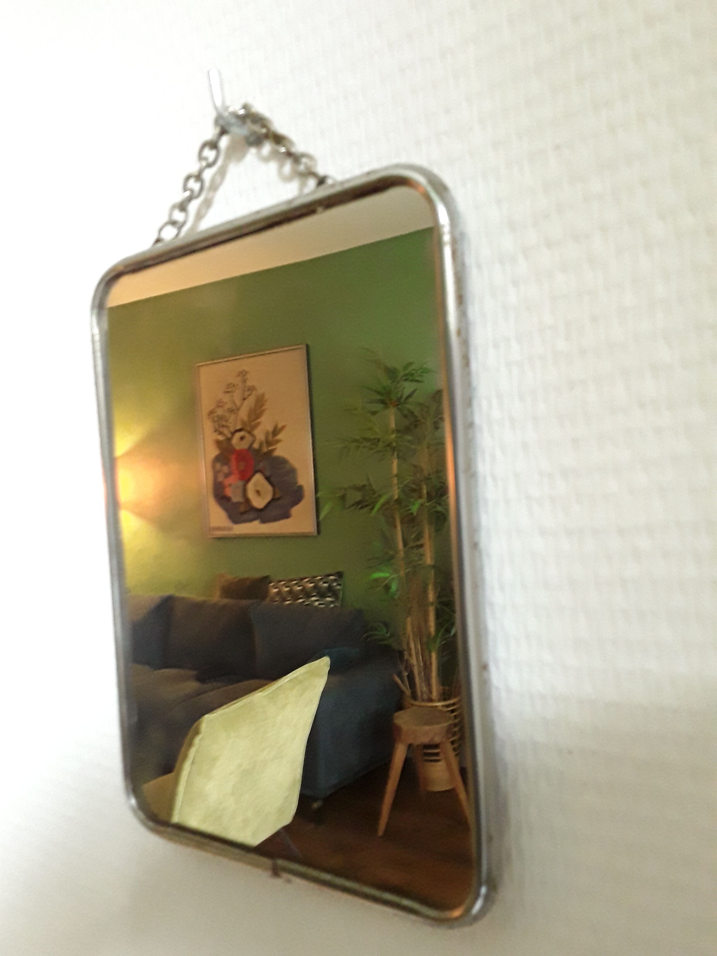 Vintage barber mirror with chain
