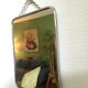 Vintage barber mirror with chain