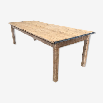 Washed-out wooden dining table