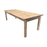 Washed-out wooden dining table