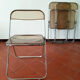 Trio of chairs folded Castelli design Giancarlo company