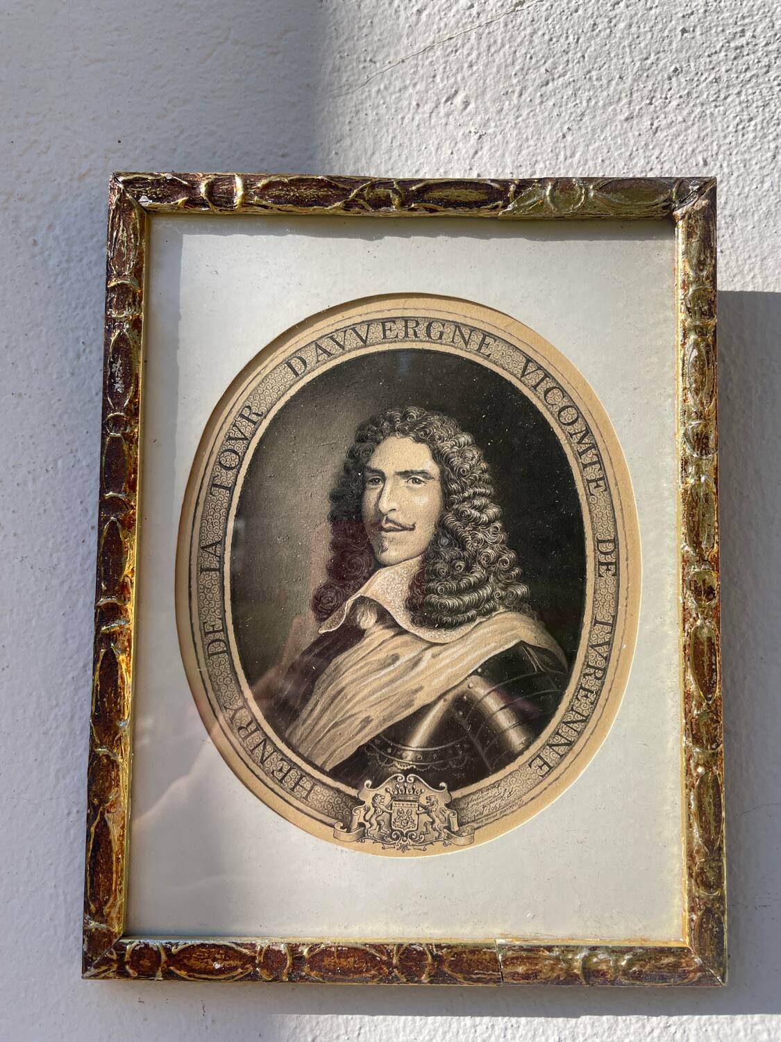 Classic antique man portrait in gilded frame