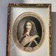 Classic antique man portrait in gilded frame
