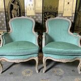 Pair of green Louis XV style bergères armchairs