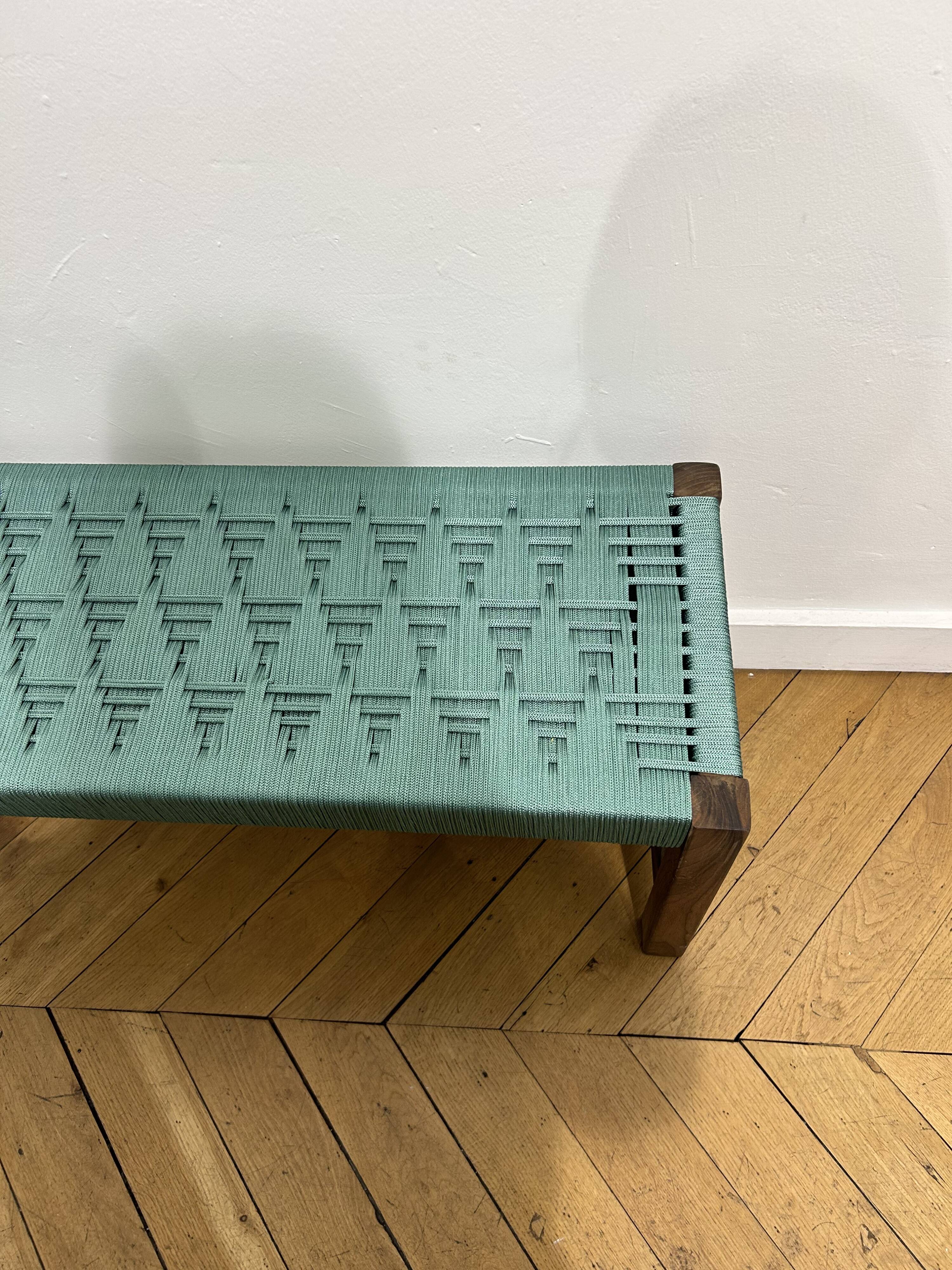 Bench in blue-green woven walnut