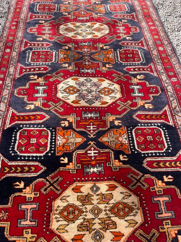 Long antique Persian carpet