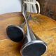 Pair of designer candle holders in stainless steel