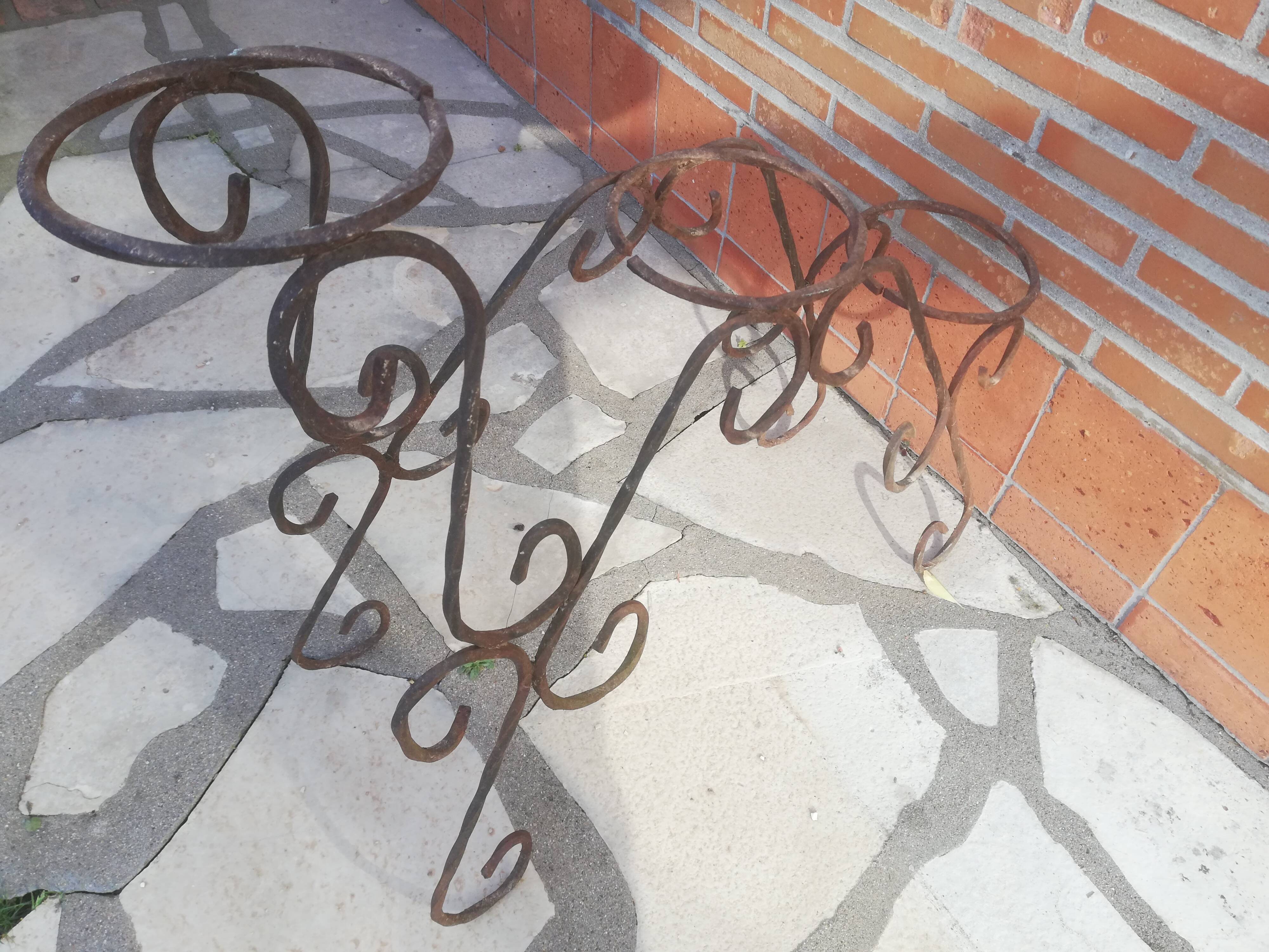 Wrought iron plant holders
