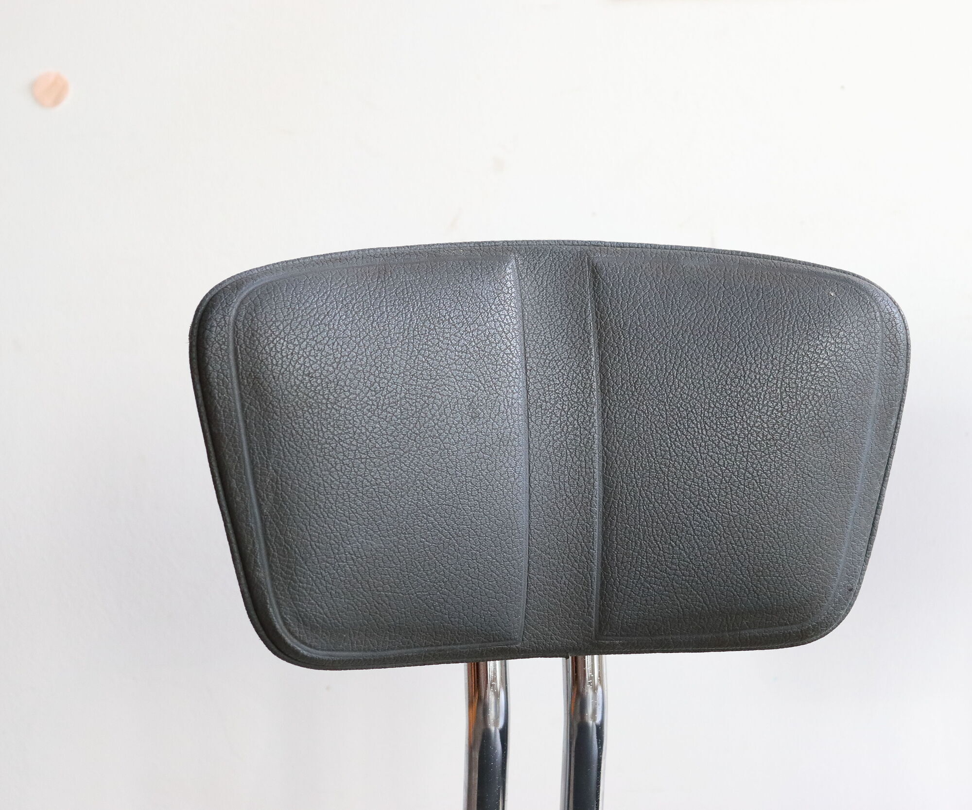 Pair of workshop chairs from the 50s in chrome steel and imitation leather