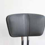 Pair of workshop chairs from the 50s in chrome steel and imitation leather
