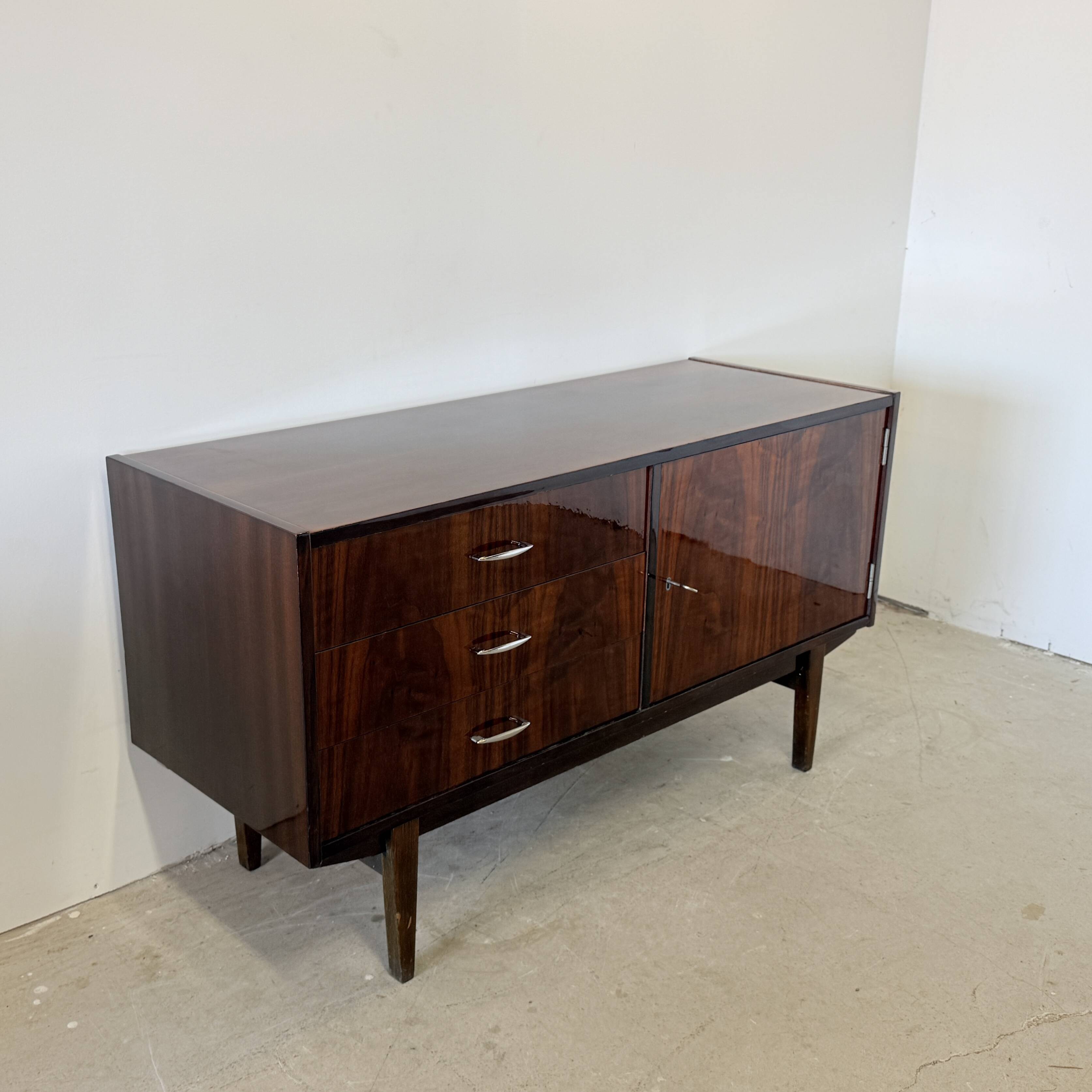Subtle high-gloss sideboard in Scandinavian style