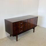 Subtle high-gloss sideboard in Scandinavian style