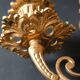 Antique three-light openwork brass church candelabrum.