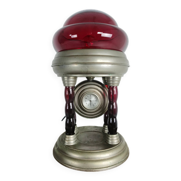 Unique vintage tin lamp with clockwork