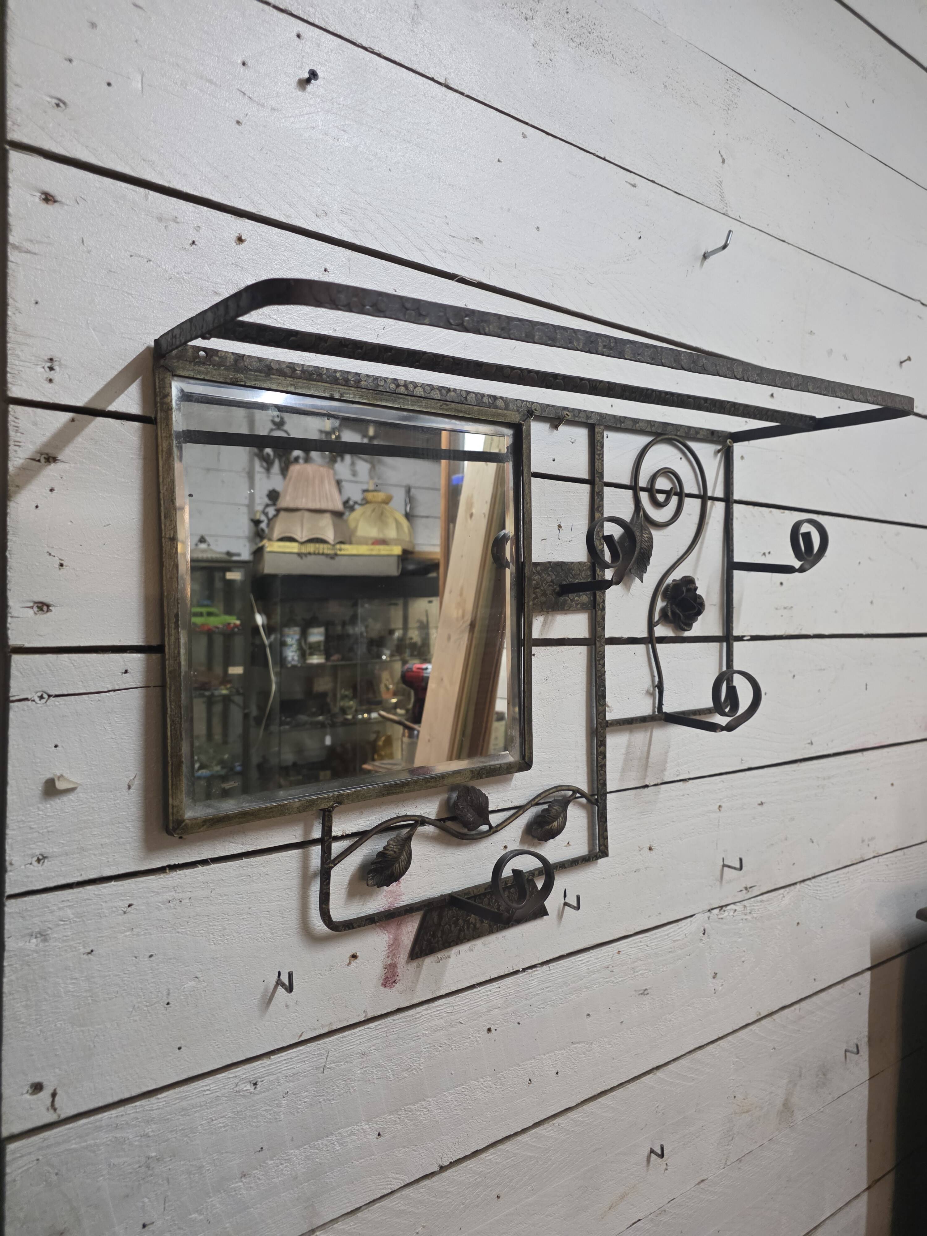 Art Deco coat rack in hammered wrought iron, 1950s.