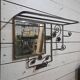 Art Deco coat rack in hammered wrought iron, 1950s.