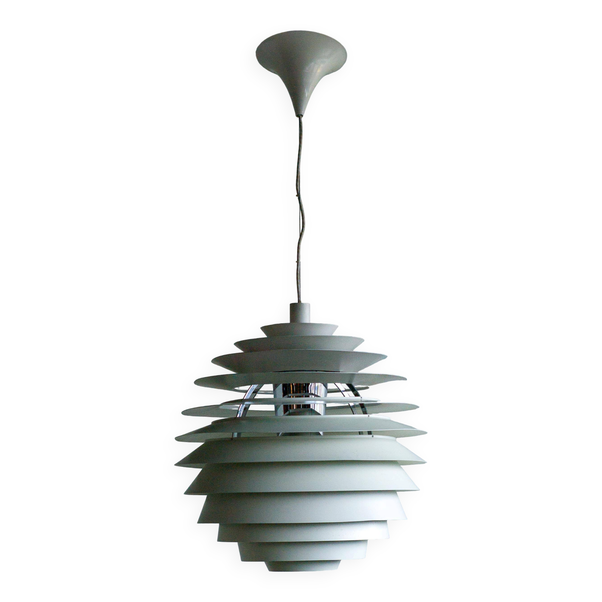 Large pendants from the early last century from the Louvre by Poul Henningsen for Louis Poulsen, 1962.