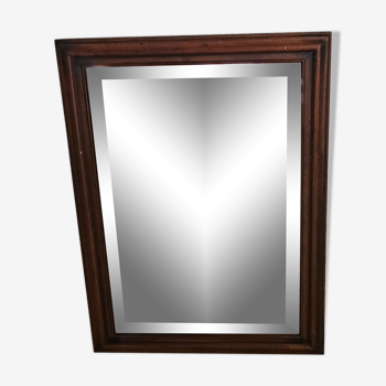 Miroir à verre biseauté dans son cadre en bois