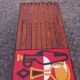1970s design coffee table with ceramic and wood top, metal legs.
