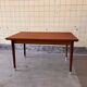 Extendable dining table in teak