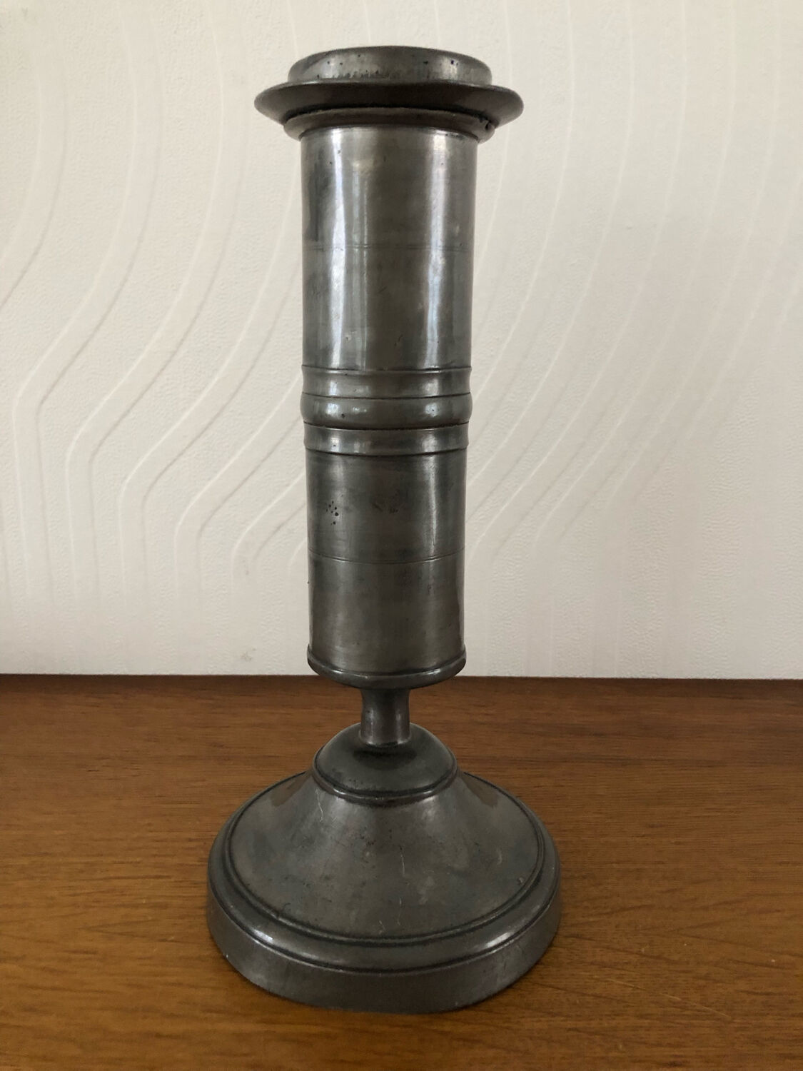 Antique pewter candle holder
