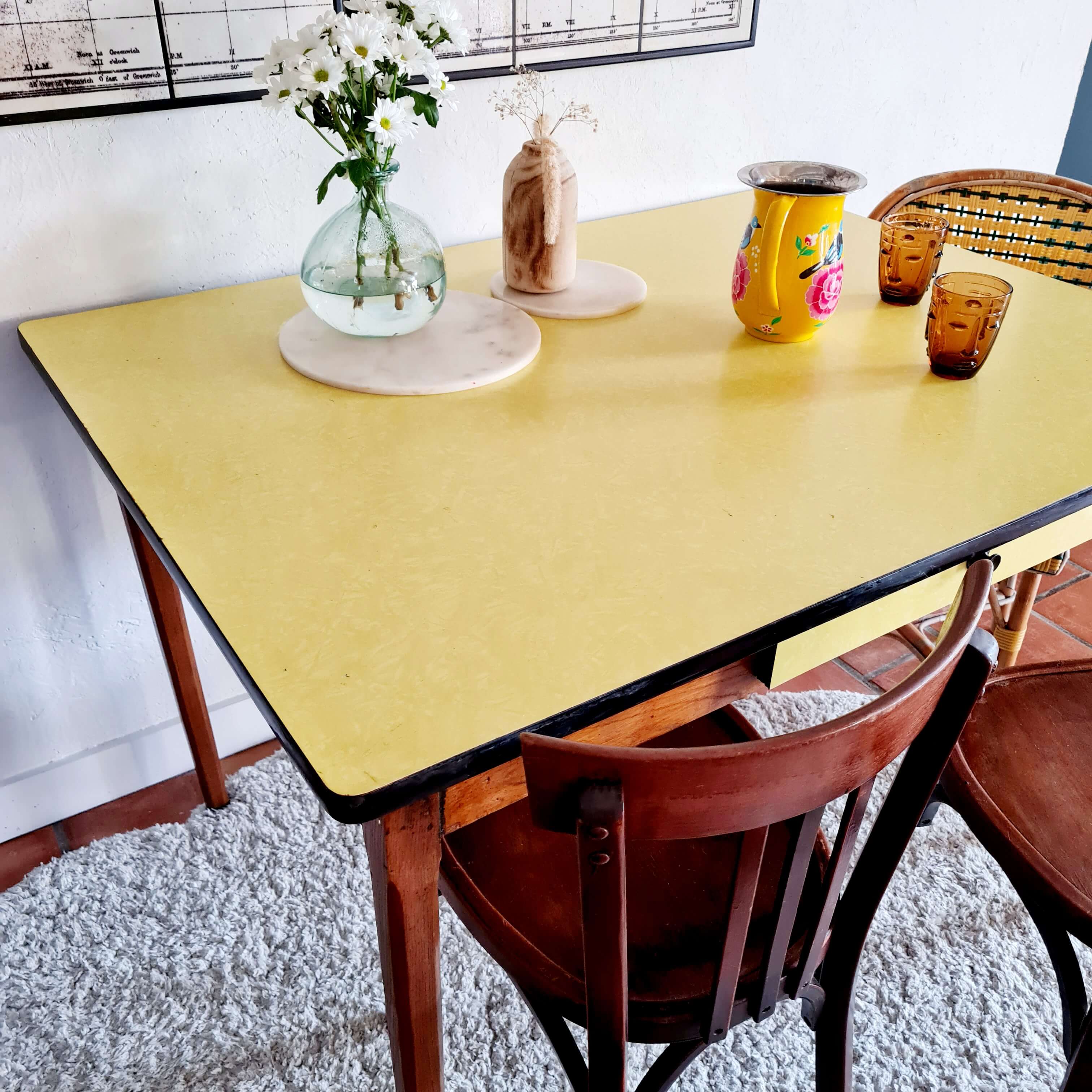 Old wooden farmhouse table and yellow formica top