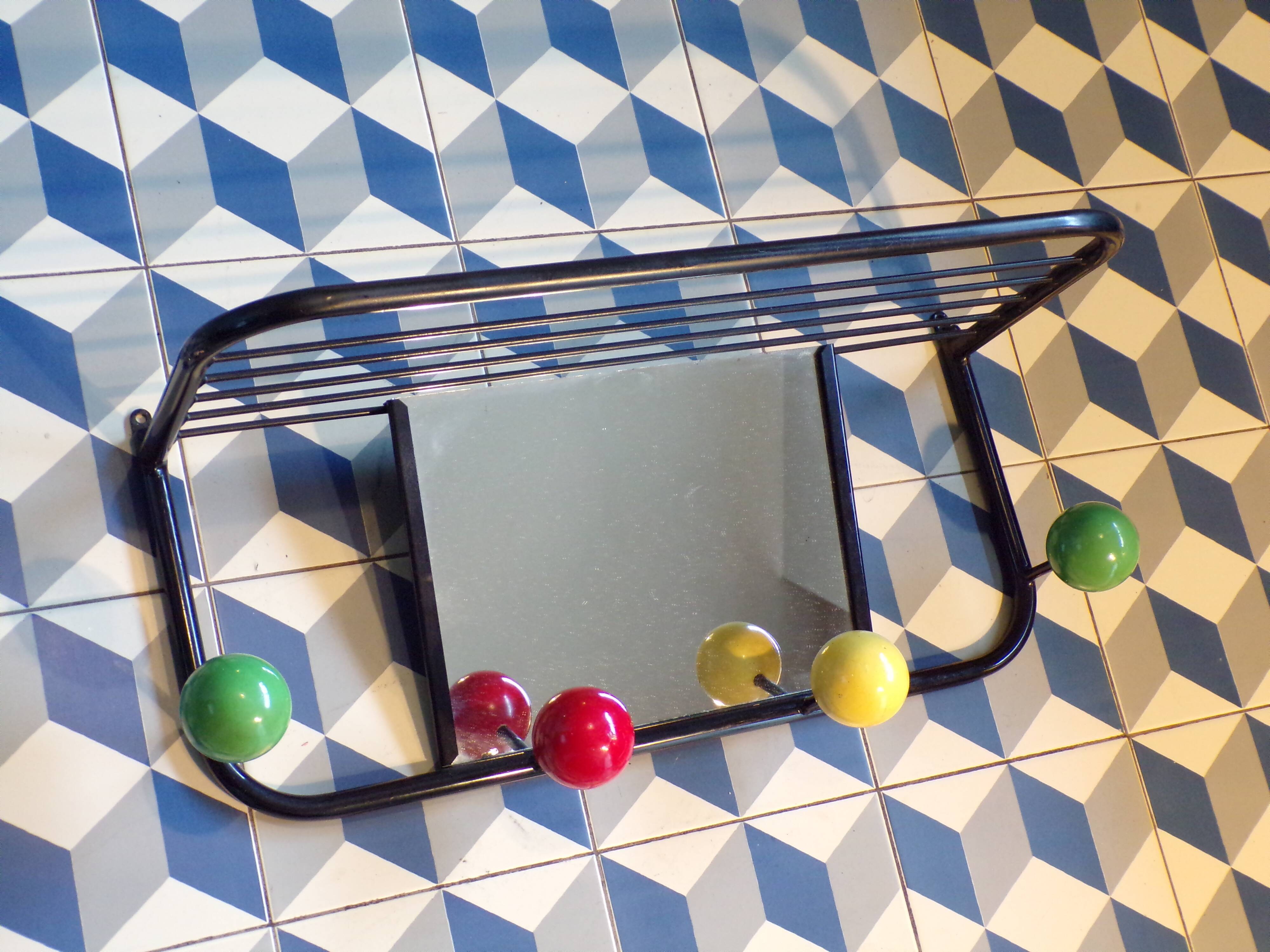 Vintage coat racks with balls and mirror