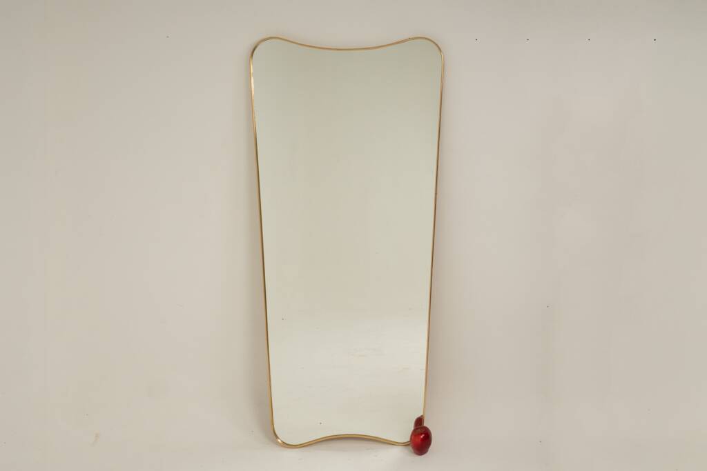 Patinated brass-framed mirror. 1980s/90s.
