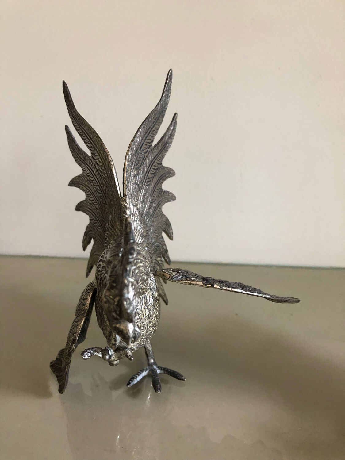 Vintage silver metal roosters