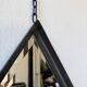 Miroir brutaliste losange en fer