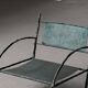Fauteuil bas en fer forgé martelé, France, vers 1960