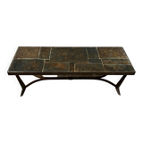 Coffee table with stone top and iron legs