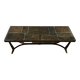 Coffee table with stone top and iron legs