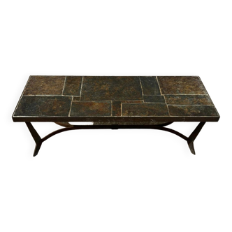 Coffee table with stone top and iron legs