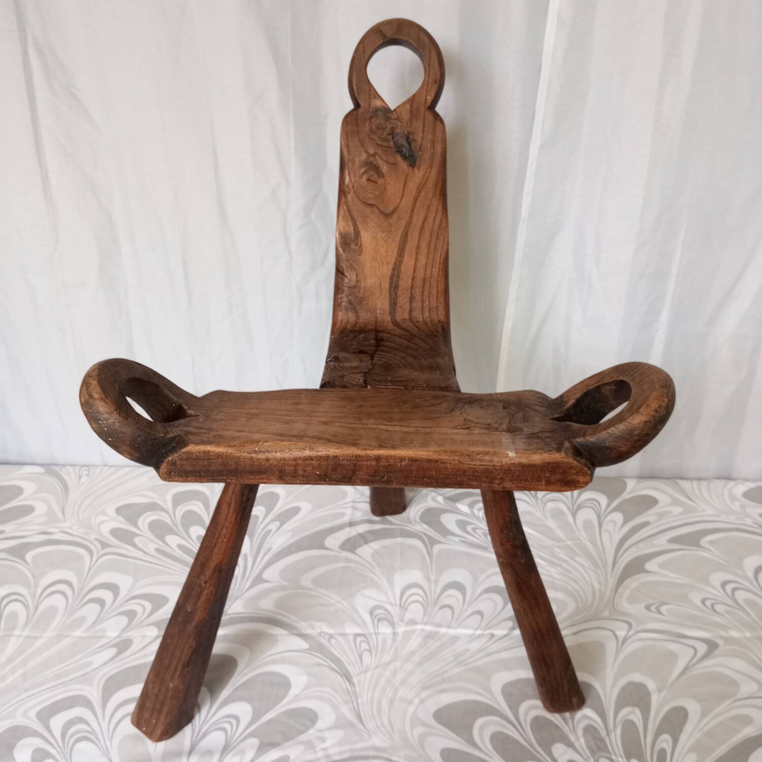 Brutalist tripod chairs in solid wood