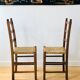 Paire de chaises rustiques en bois et assises paillées