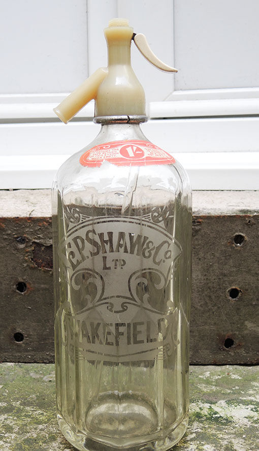 Old transparent glass siphon: EP. Shaw & Co Ltd – Wakefield