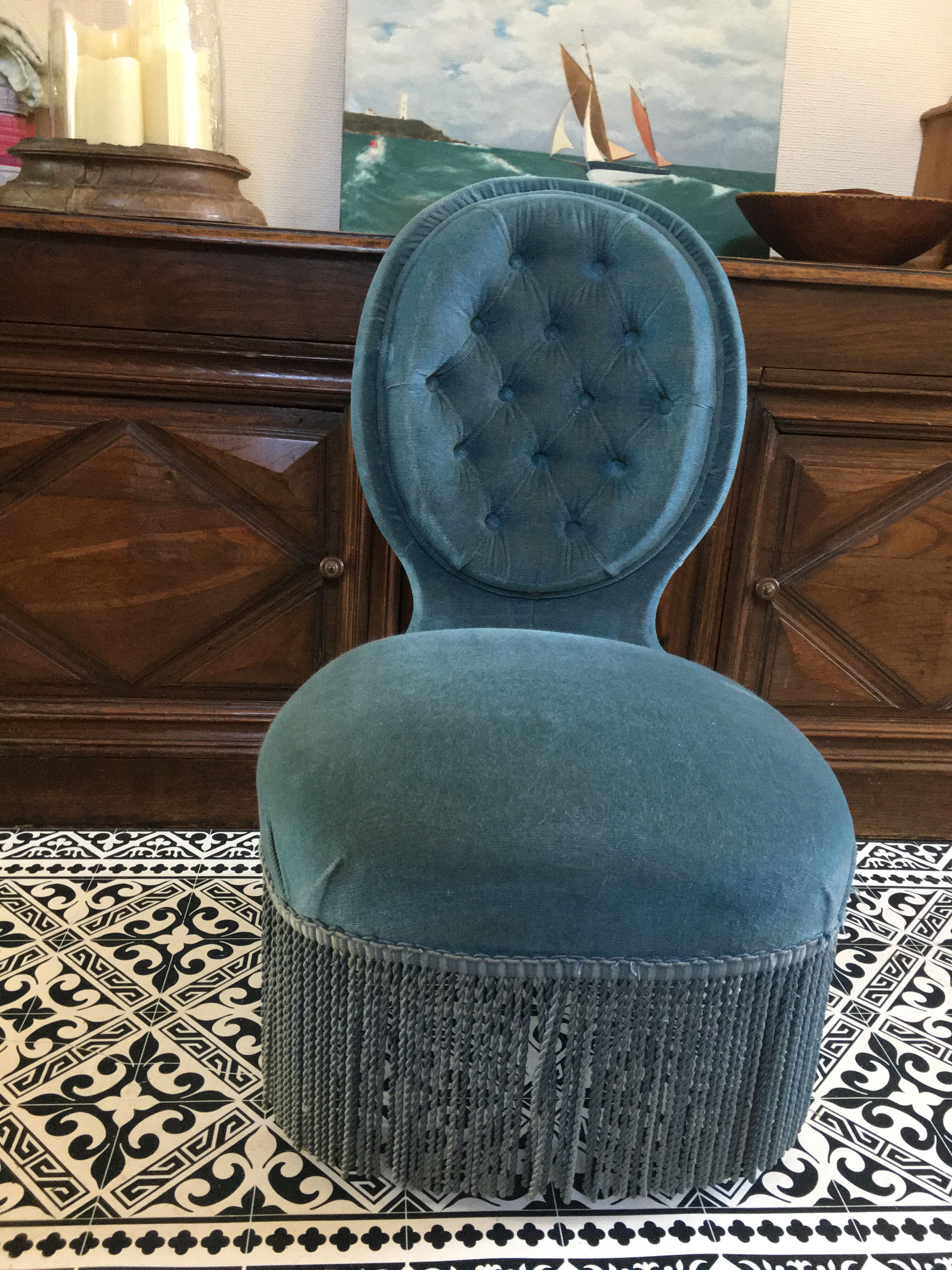 Blue heater with fringed medallion shape