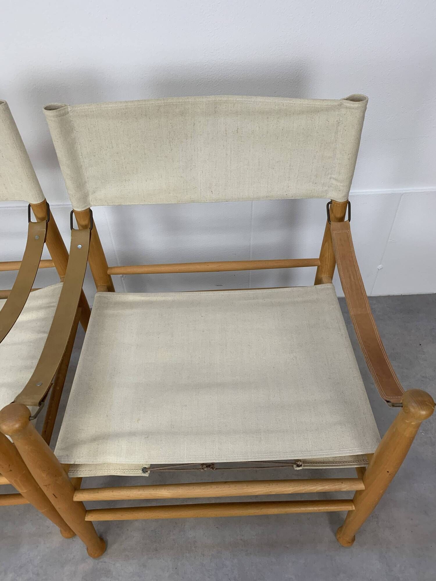 Pair of safari armchairs canvas and leather stretched